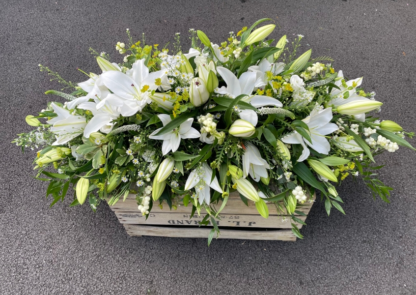 Casket Spray of all white lilies & foliage