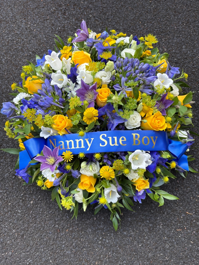 Blue and yellow posy with ribbon banner