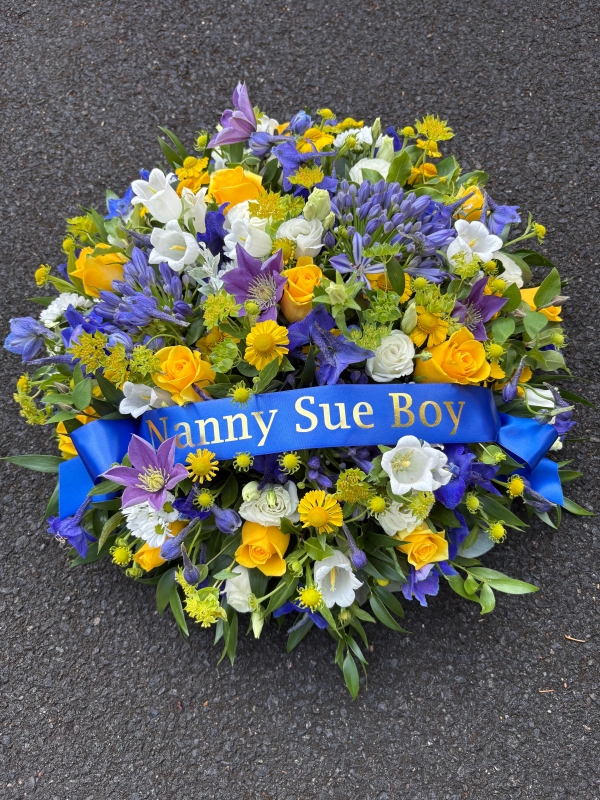 Blue and yellow posy with ribbon banner