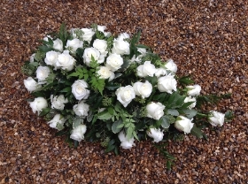 Single ended spray of white roses