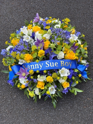 Blue and yellow posy with ribbon banner
